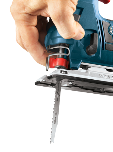 Bosch jigsaw with 'extra-clean' Wood blade visible, held by a hand. 'BOSCH' and 'SWISS MADE' are visible on the blade.