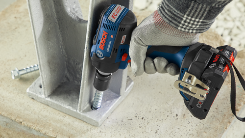 Bosch GDS18V-221 impact driver installing a bolt into a metal structure.