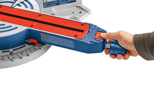 Bosch miter saw with a hand operating a blue handle.