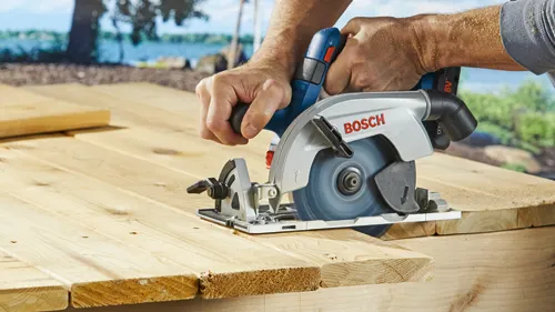 Bosch circular saw cutting wood.