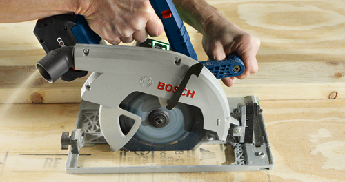 Bosch circular saw cutting wood, with "BOSCH" logo visible.