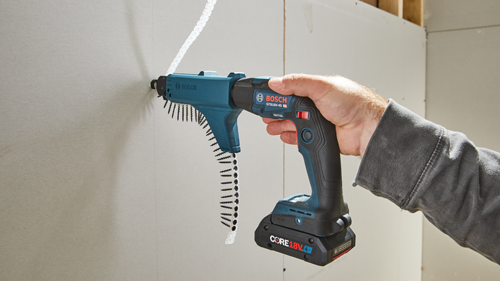 Bosch GTB18V-45 HD cordless screw gun driving screws into drywall, held by a person. "CORE 18V 4Ah" label.