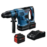 Bosch GBH18V-36C cordless rotary hammer, CORE18V batteries, and charger; with "TURBO BRUSHLESS", "Boschhammer", "CORE18V 12Ah", and "ACTIVE AIR COOLING" markings.