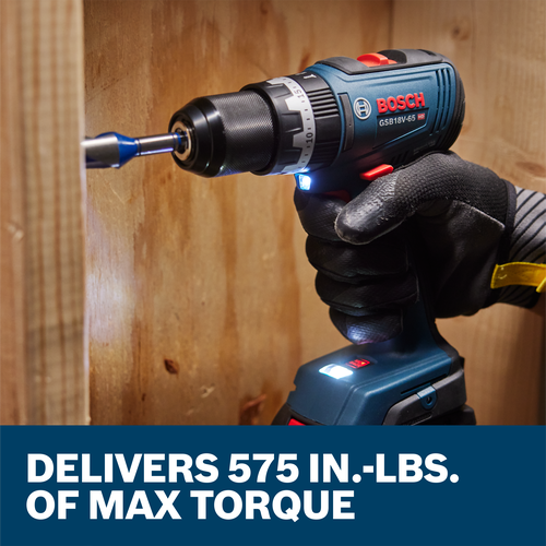 Bosch GSB18V-65 HD brushless drill being used to drill into wood; DELIVERS 575 IN.-LBS. OF MAX TORQUE displayed below.