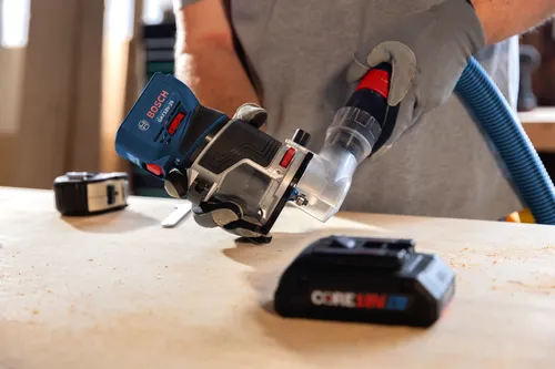 Bosch cordless palm router GKF18V-25 model application image on wood working.