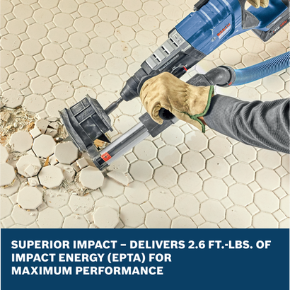 Bosch GBH18V-28DC SDS-plus® Bulldog™ Rotary Hammer with a dust collection attachment breaking up tiles on a floor.