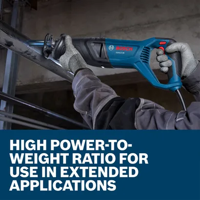 A worker using a Bosch GSA12-30 Corded Reciprocating Saw to cut through a metal pipe.