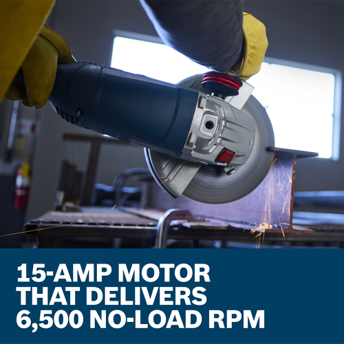 A worker is cutting a metal beam with a Bosch GWS22-230J 9 In. Angle Grinder in a metal shop.