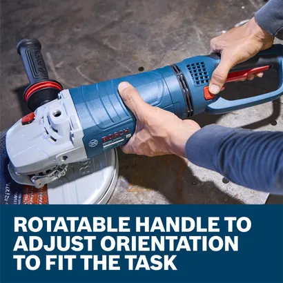 A worker pressing a button to rotate the handle on a Bosch GWS25-180PR 7 In. Large Angle Grinder in a workshop.