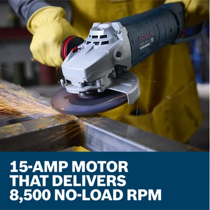 The worker using the Bosch GWS25-180JR 7 In. Large Angle Grinder to grind the edge of a piece of metal in a work shop.