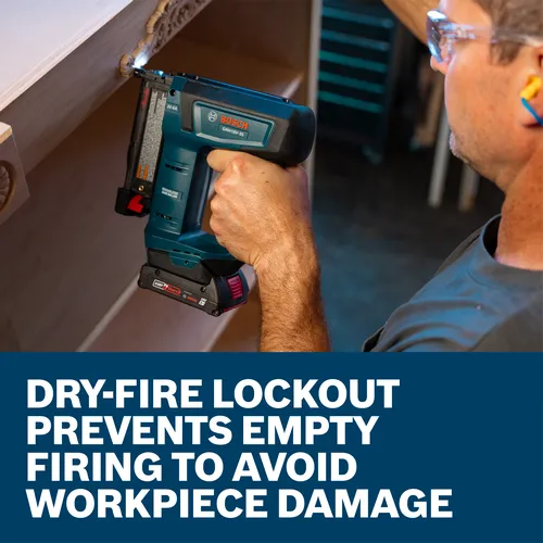 The worker using the Bosch GNH18V-35N 18V Brushless 23 Gauge Pin Nailer to nail pieces of wood.