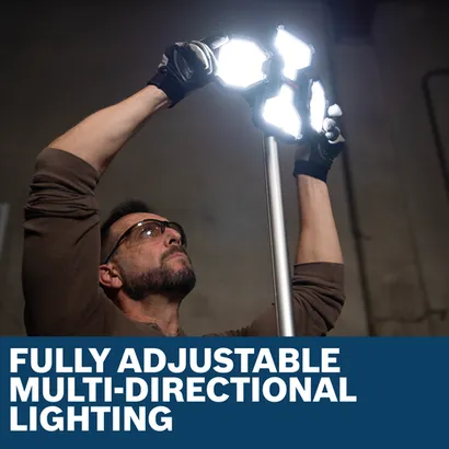 Image of worker adjusting the lamp head of Bosch GLT18V-5000N 18V Tower Light.