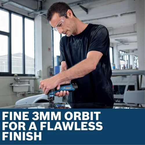 Image of worker using the Bosch GSS12V-32N 12V Compact 1-1/4 In Orbital Sander for finishing a car.