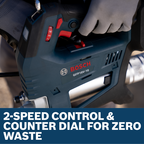 Image of worker holding the Bosch GFP18V-10N 18V Grease Gun.