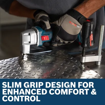 Image of worker using the Bosch GSC18V-16EN 18V 16-Gauge Metal Shear to cut a metal plate.