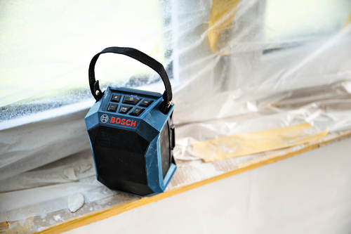 Image of Bosch GPB18V-1CN 18V Jobsite Bluetooth® Speaker positioned near a window.