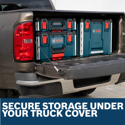 Bosch L-Boxx contractor tool storage mounted in the open tailgate of a pickup truck.