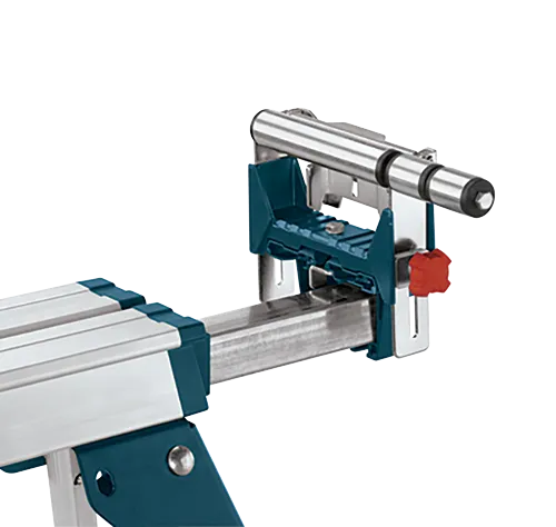 Soporte para herramientas Bosch, con componentes metálicos y azul-verdosos, un mando rojo y un cilindro plateado.