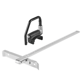 Herramienta negra y plateada y regla plateada con mediciones.