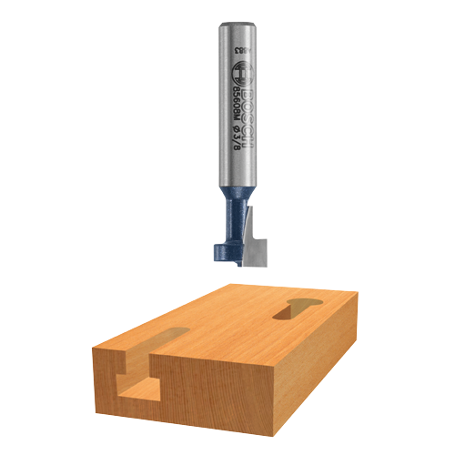 Bosch 85608M Ø3/8" fresa para router sobre un bloque de madera con recortes.