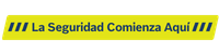 Una brillante señal de seguridad amarilla dice "La Seguridad Comienza Aquí" sobre un fondo negro, enfatizando la seguridad.